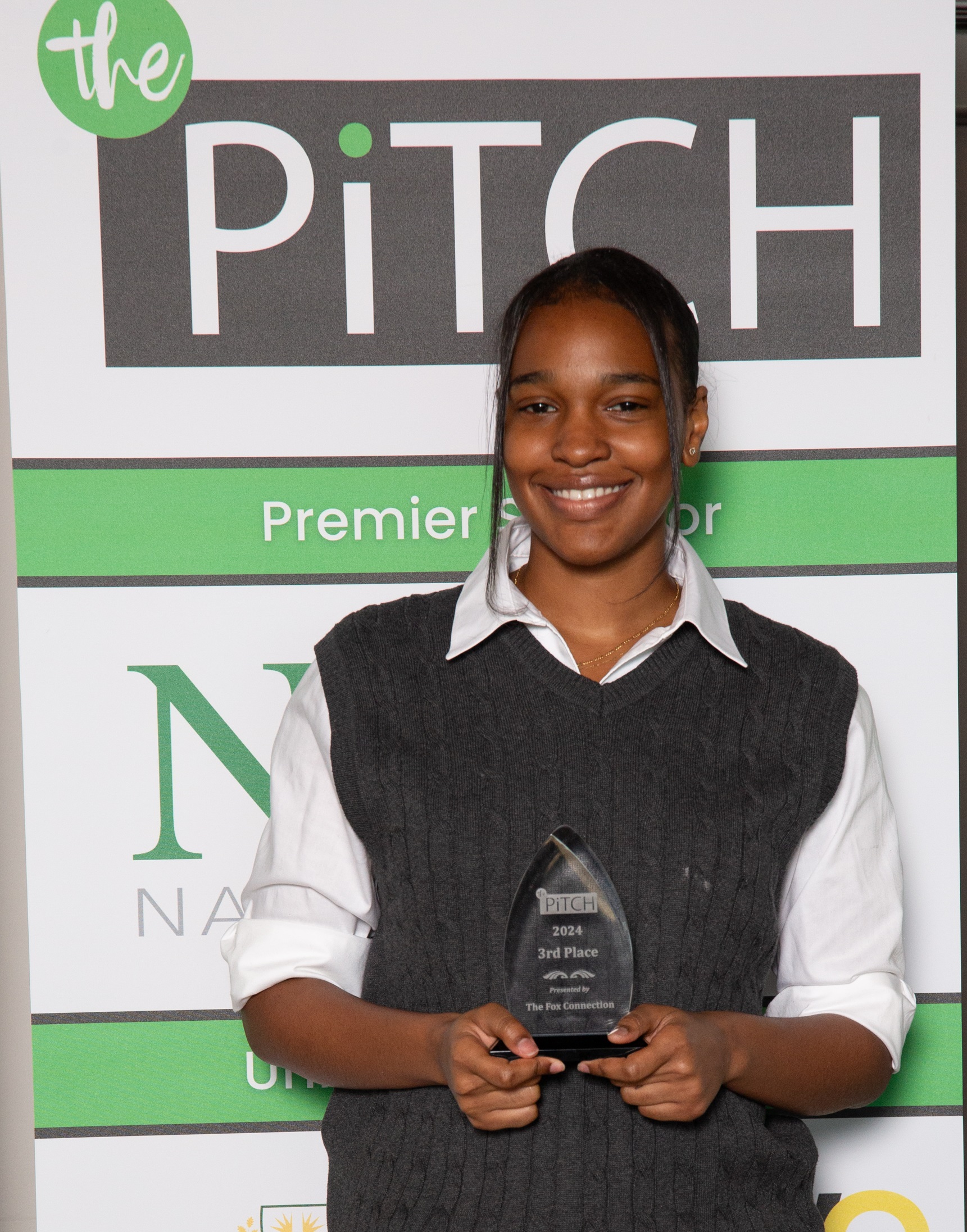 Safiya Grant holds her trophy following The Pitch competition.