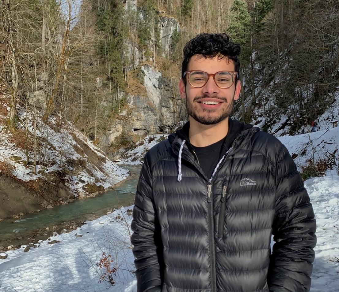 Ricardo Jimenez posing in front of a frozen creek