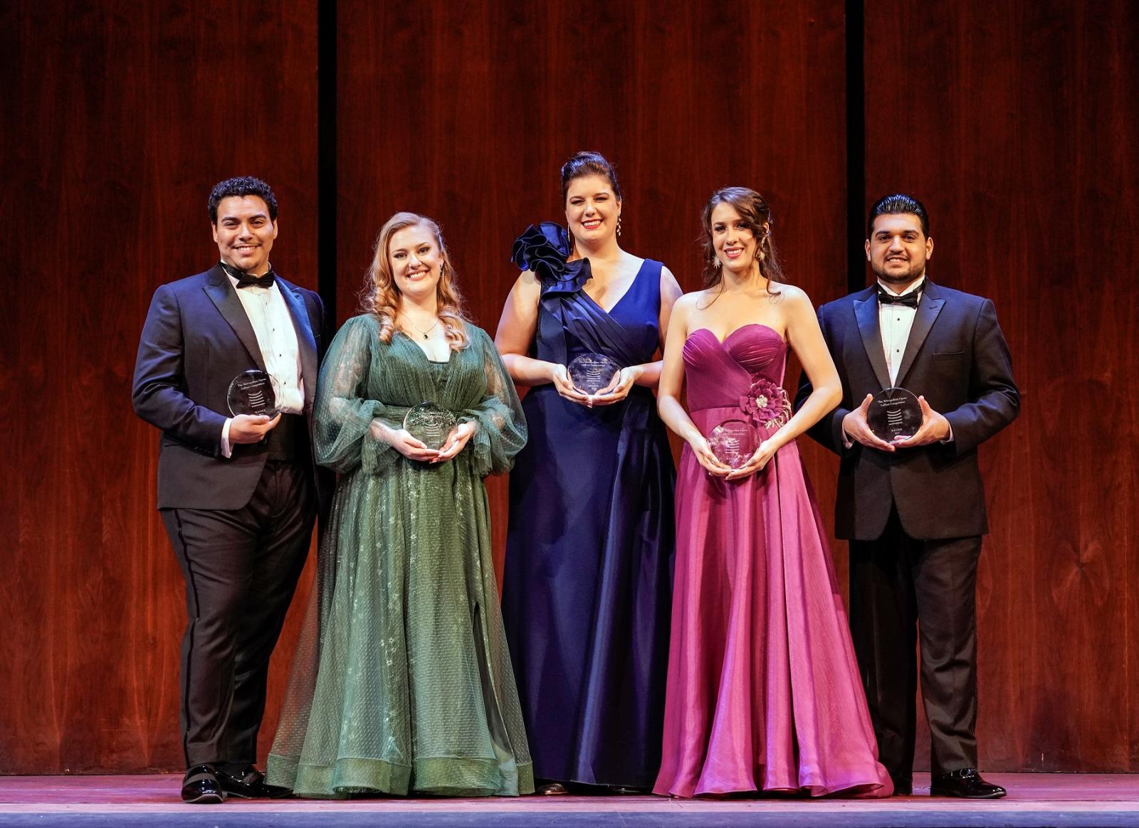 Emily Richter (center) is joined by the other four winners of the Met opera competition.