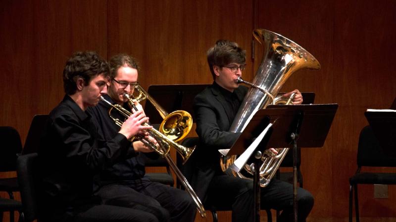 Performers play instruments during 2018 brass recital