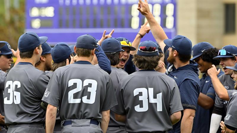The Vikings baseball team gathers together at the start of the NCAA Division III Tournament regional in Stevens Point. (Photo by Paul Wilke)