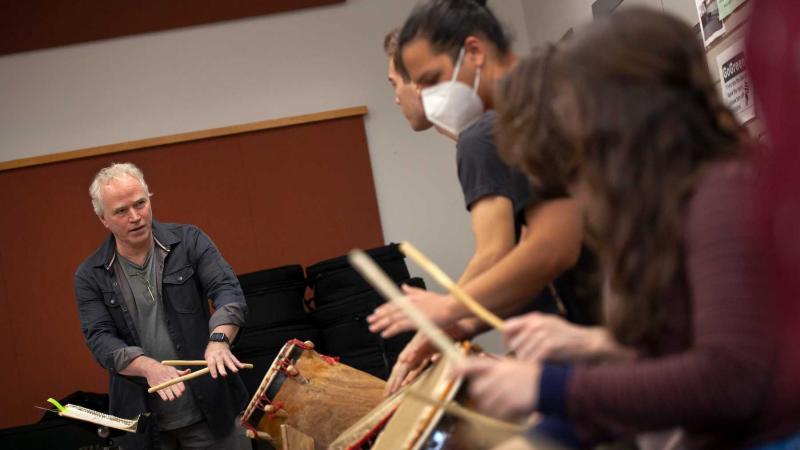 Dane Richeson works with percussion students in his studio.