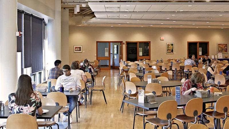 Students in Andrew Commons eating
