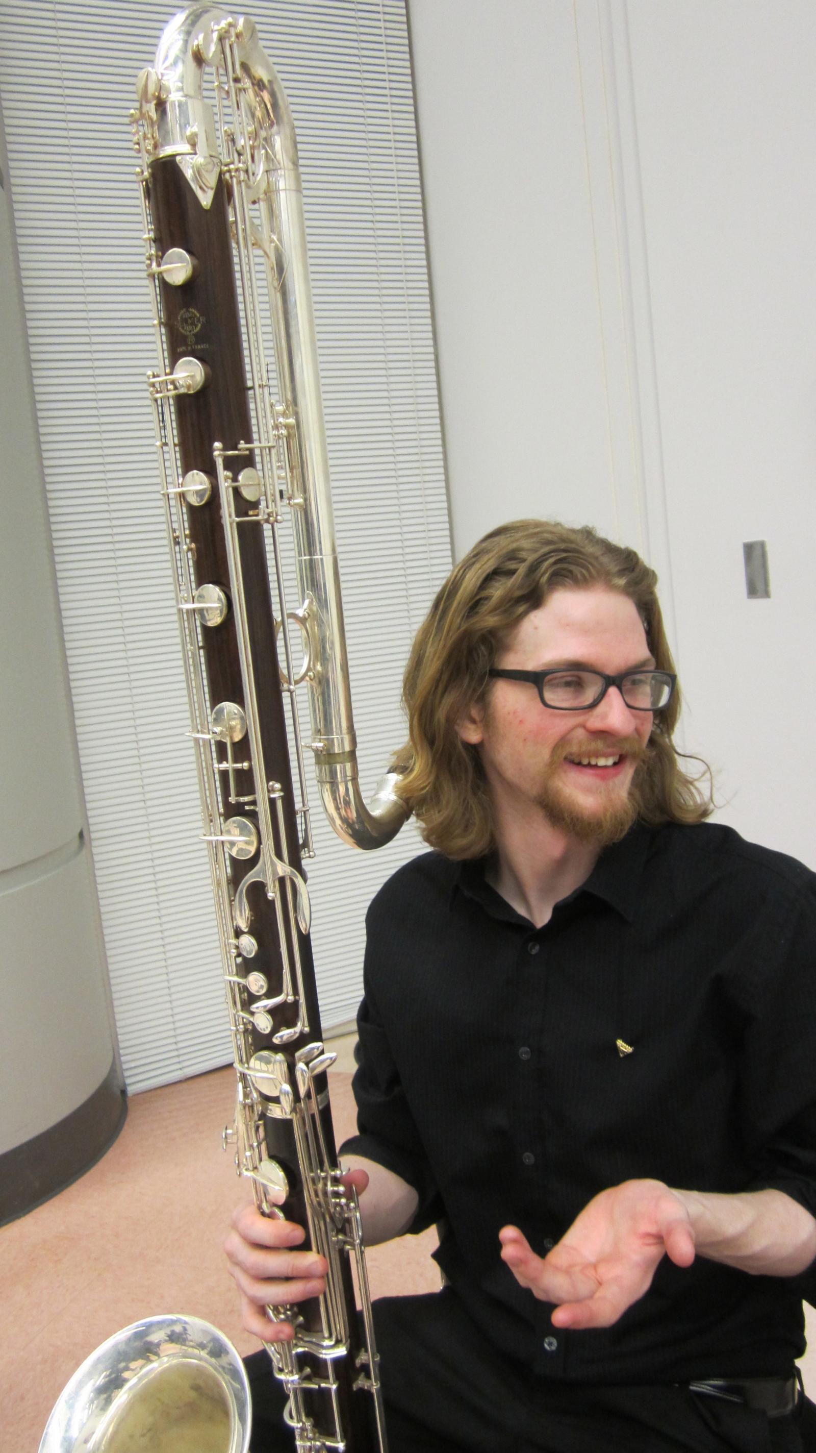 Student with a contrabass clarinet