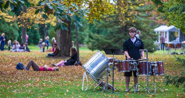 Percussionist playing outside
