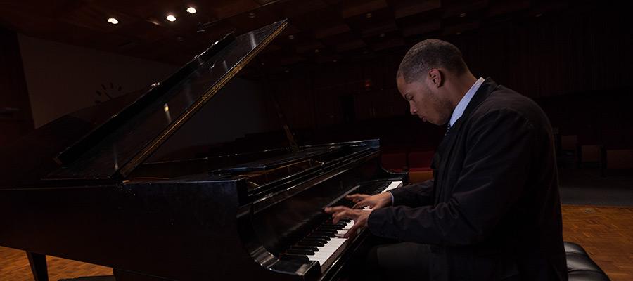 Pianist performing in Harper Hall