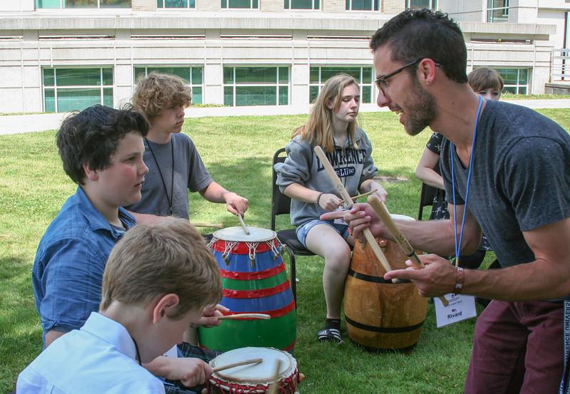 Luke Rivard teaching percussion to Academy students