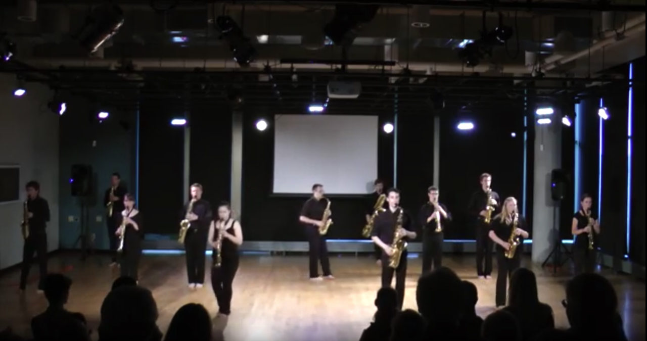 Saxophone ensemble performing in Warch