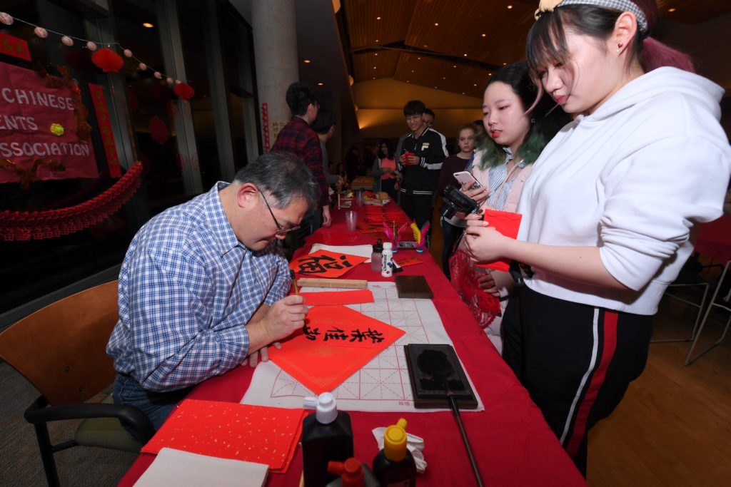 A table at last year's Lunar New Year draws visitors.