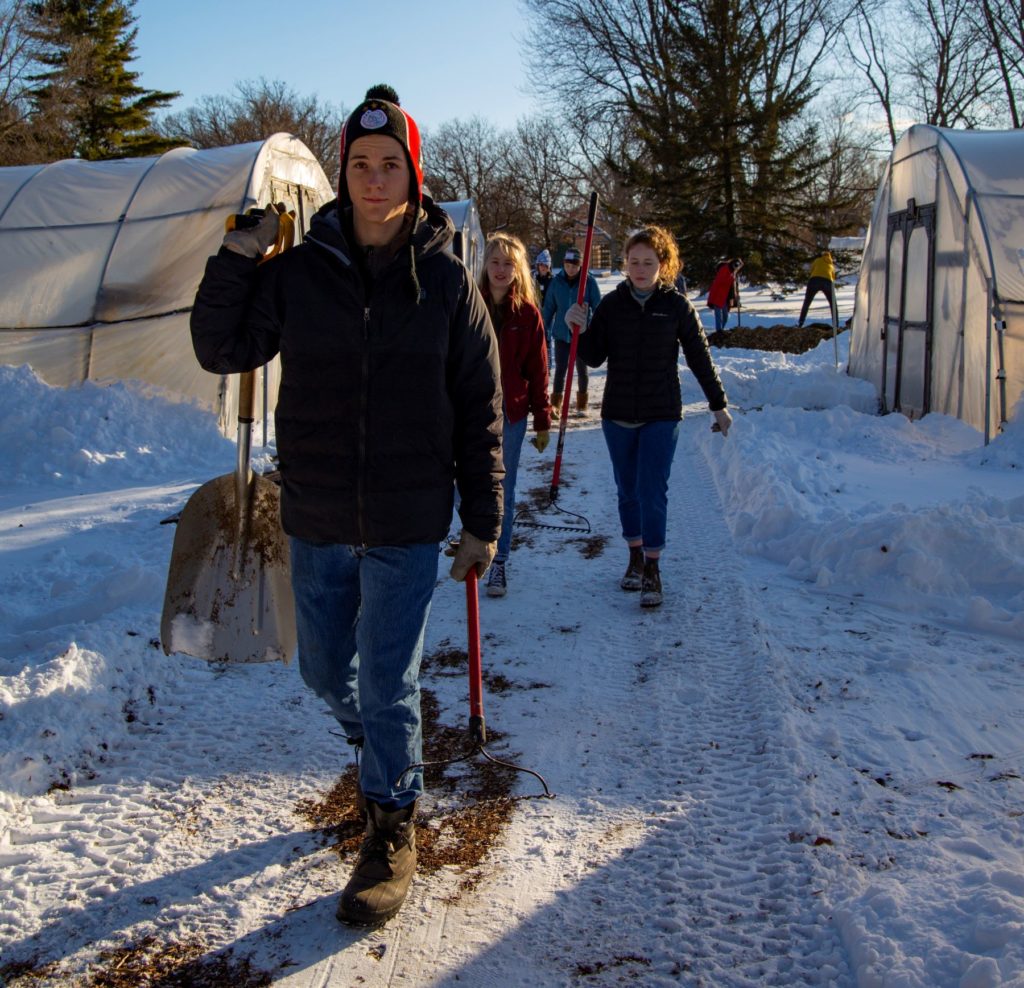 Lawrence students go to work during a volunteer outing at Riverview Gardens