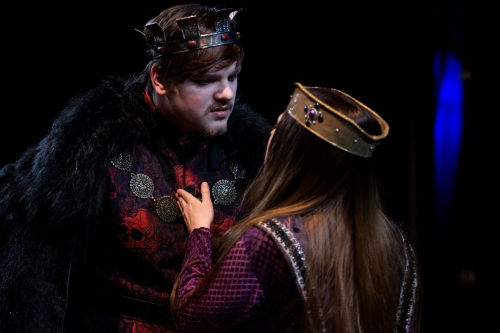 Two students performing as Richard III and Queen Elizabeth 