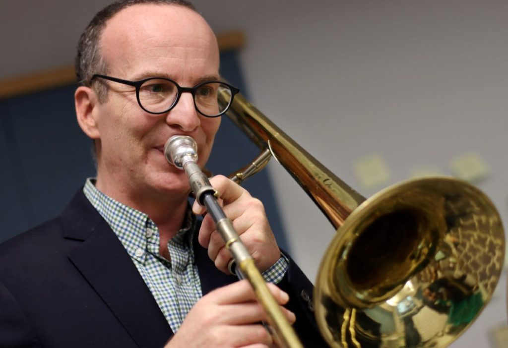 Professor Tim Albright playing the trombone