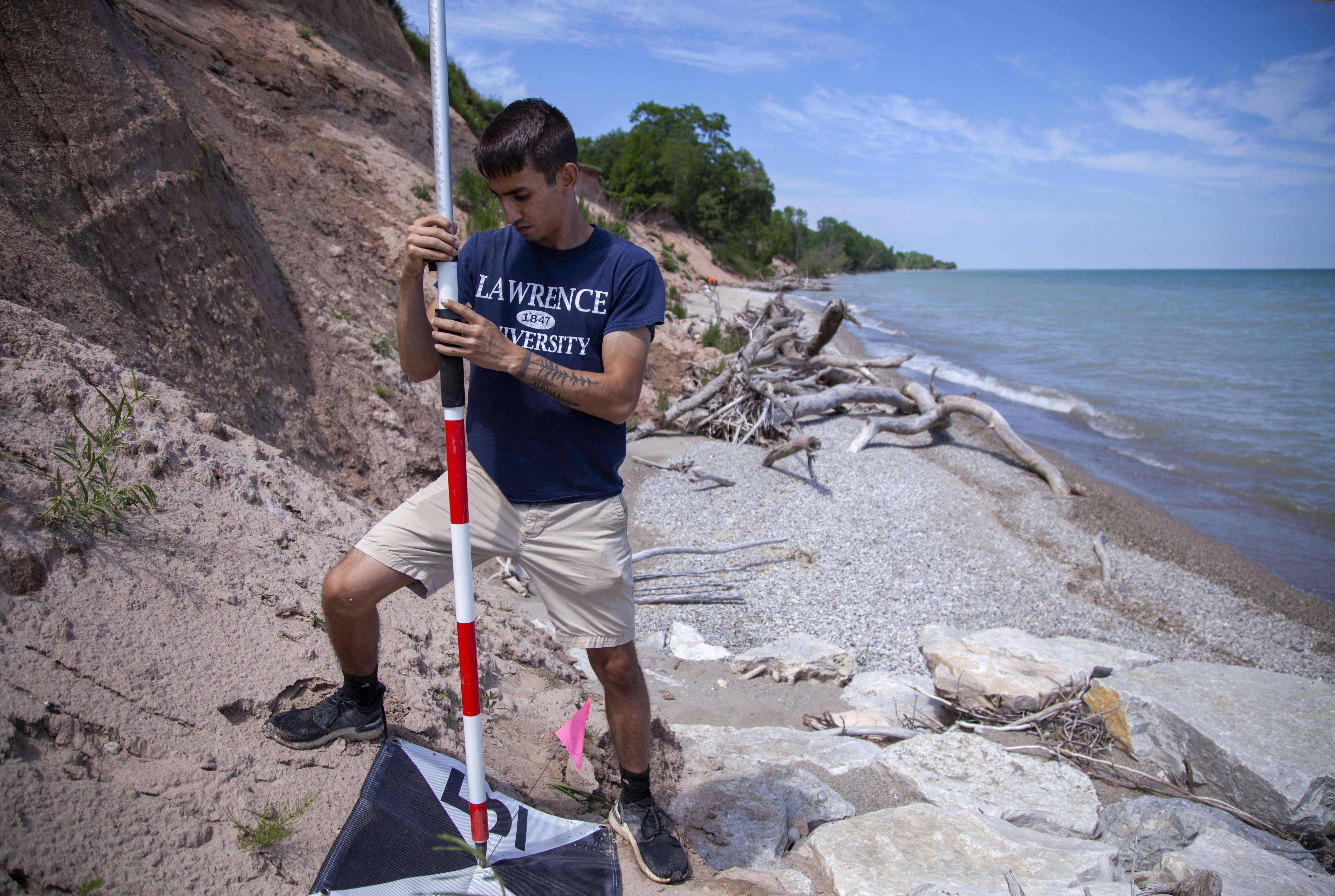 Tyler Scott ’23 works on the UAV Summer Research Program at Two Creeks Buried State Forest Natural Area Monday, July 12, 2021.
