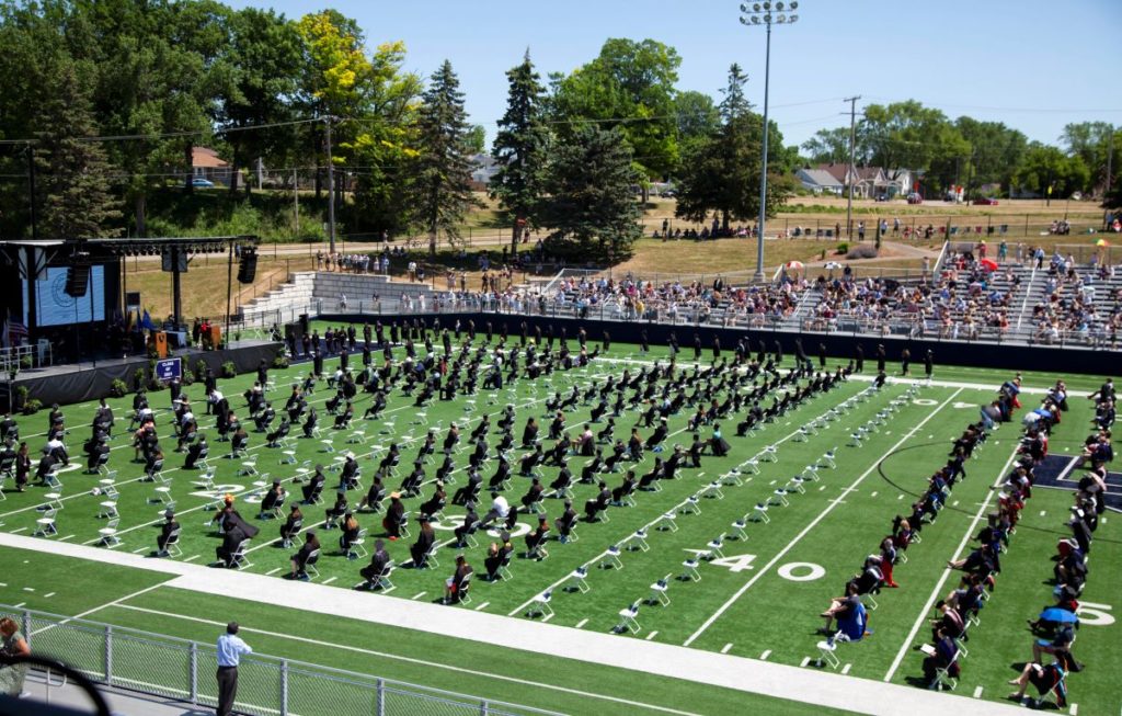 Students social distancing during Commencement ceremony at the Banta Bowl 