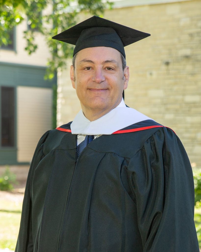 Massimiliano Verita in academic regalia 