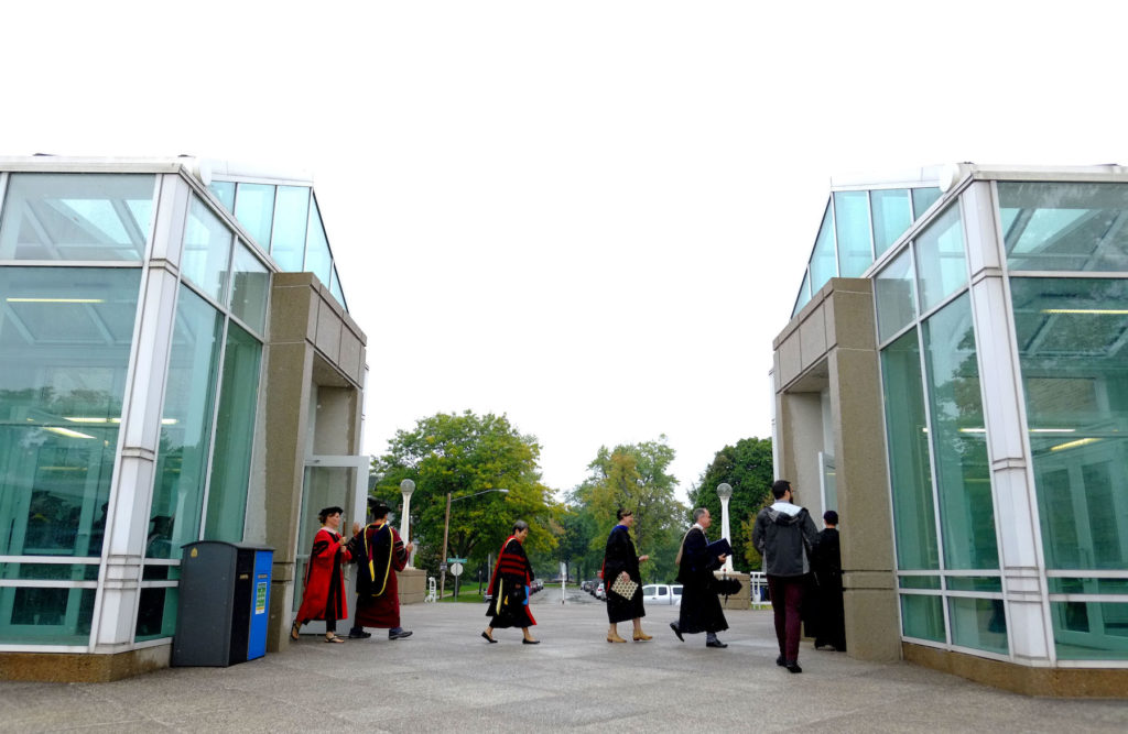 Lawrence University faculty move their procession toward Memorial Chapel