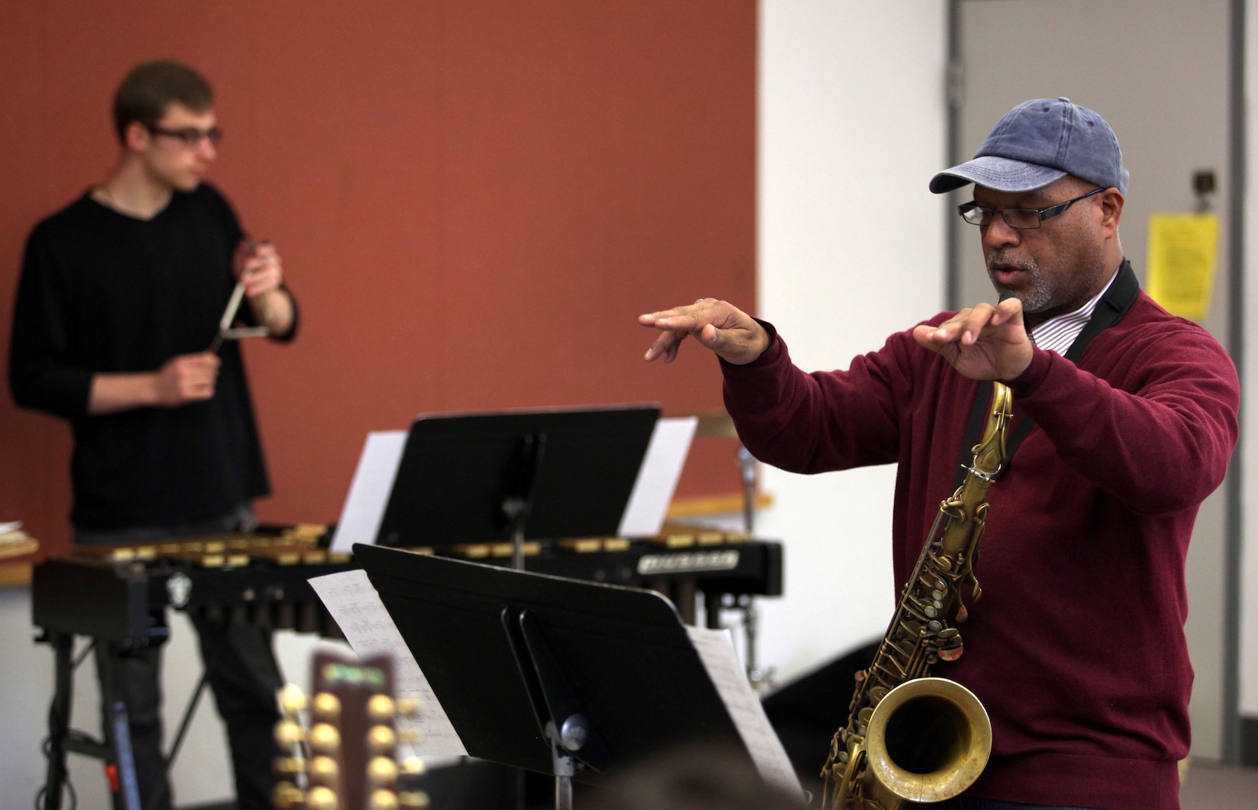 José Encarnación, assistant professor of music and director of jazz studies, works with students
