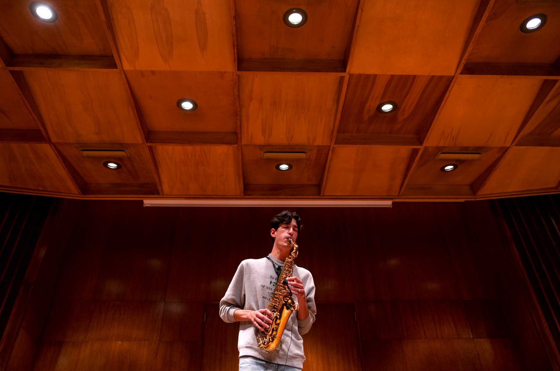 Ben Hiles, a senior, performs during saxophone studio.