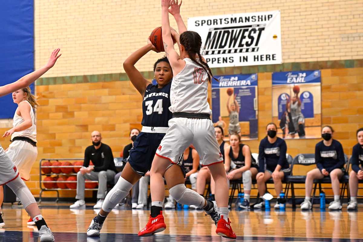 Kenya Earl works for a shot during her final game as a Viking.