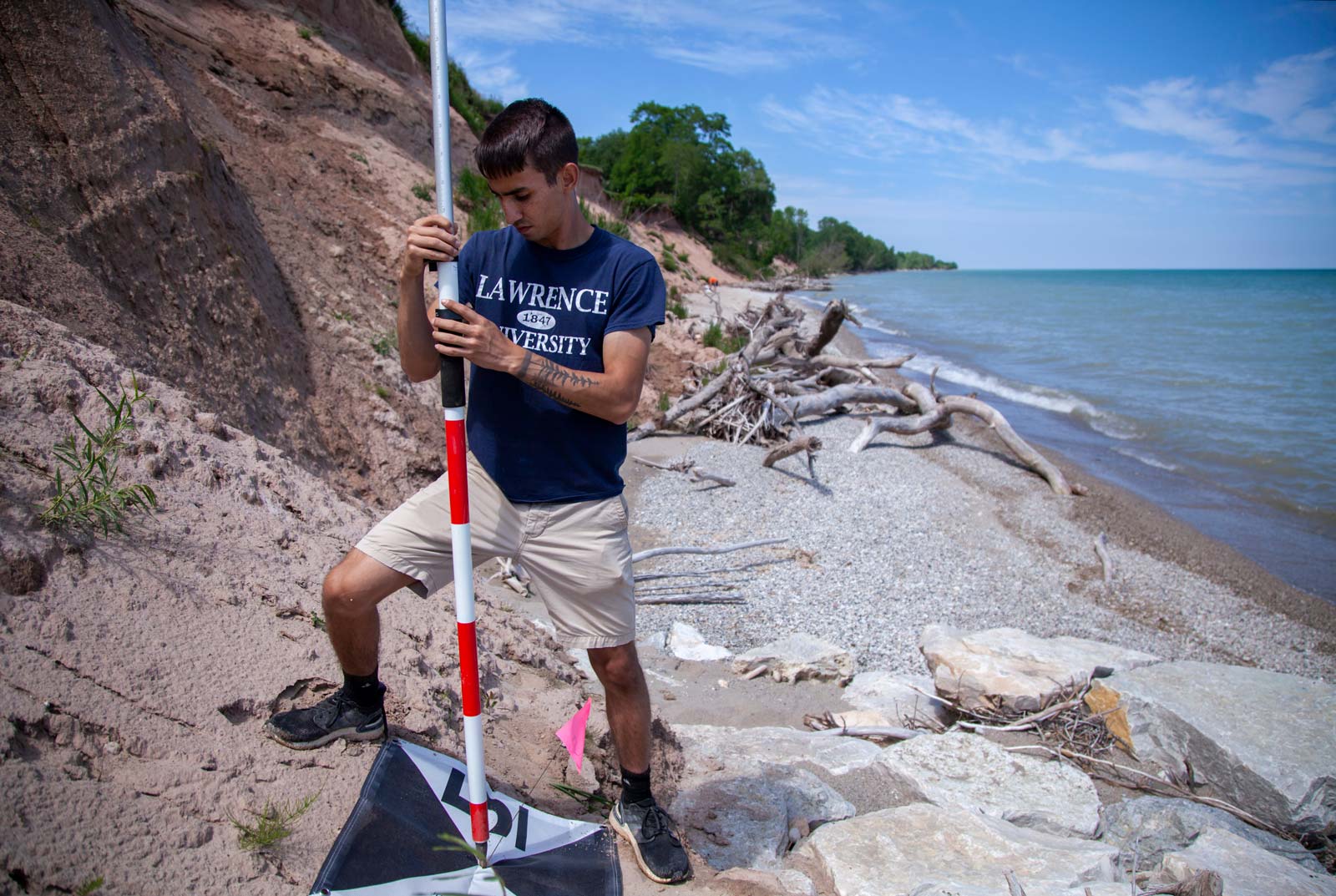 Tyler Scott ’23 works on the UAV Summer Research Program at Two Creeks Buried State Forest Natural Area Monday, July 12, 2021.