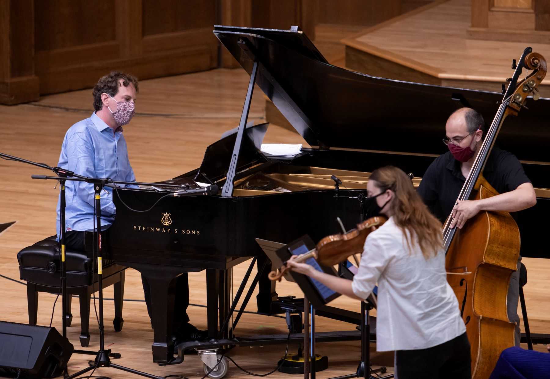 Michael Mizrahi performs on the piano at Memorial Chapel during the 2021 festival.