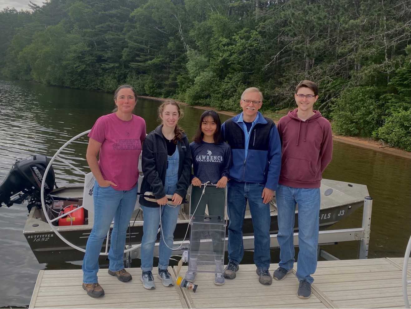 Bart De Stasio poses with students and alumni who collaborated on a summer research project at Trout Lake in Vilas County.