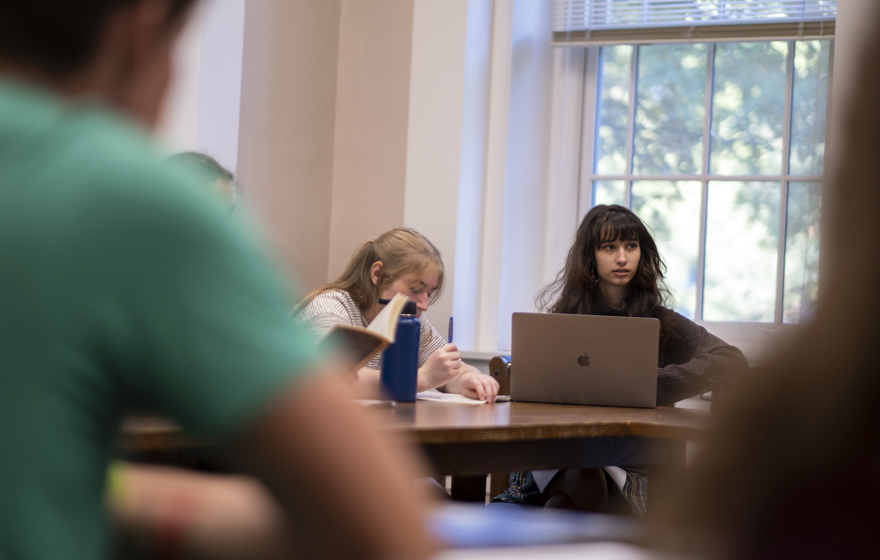 Students participate in a discussion with Professor Garth Bond during a First-Year Studies course in Main Hall. 