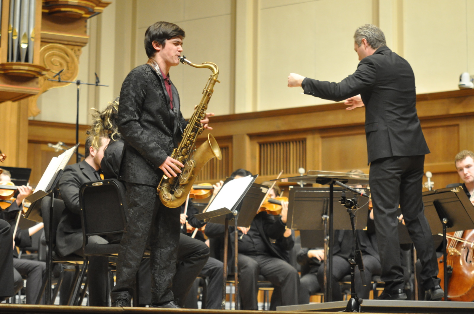 Jasper Kashou performs his composition along with the Lawrence Symphony Orchestra during a March concert.