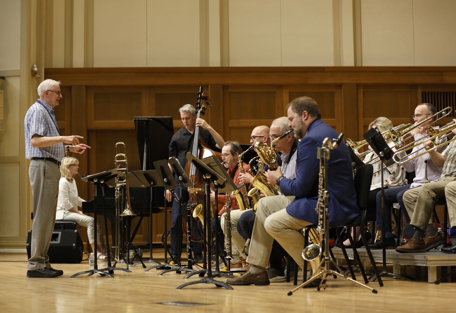 Kurt Dietrich directs the 17-member big band on the stage of Memorial Chapel.