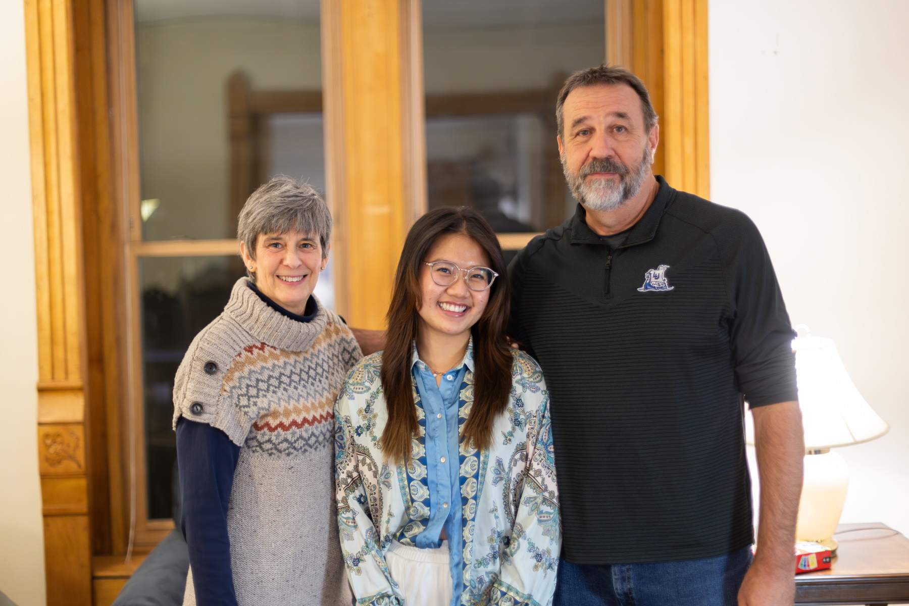 Jill and Paul Wilke pose for a photo with Charlotte Ho, a student from Vietnam.