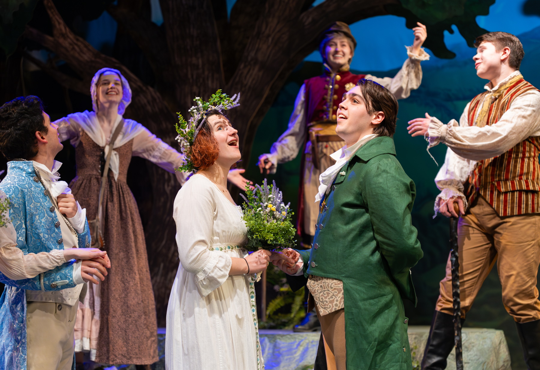 Seniors Maddie Guest and Jon Winkler take center stage in a scene from "As You Like It."