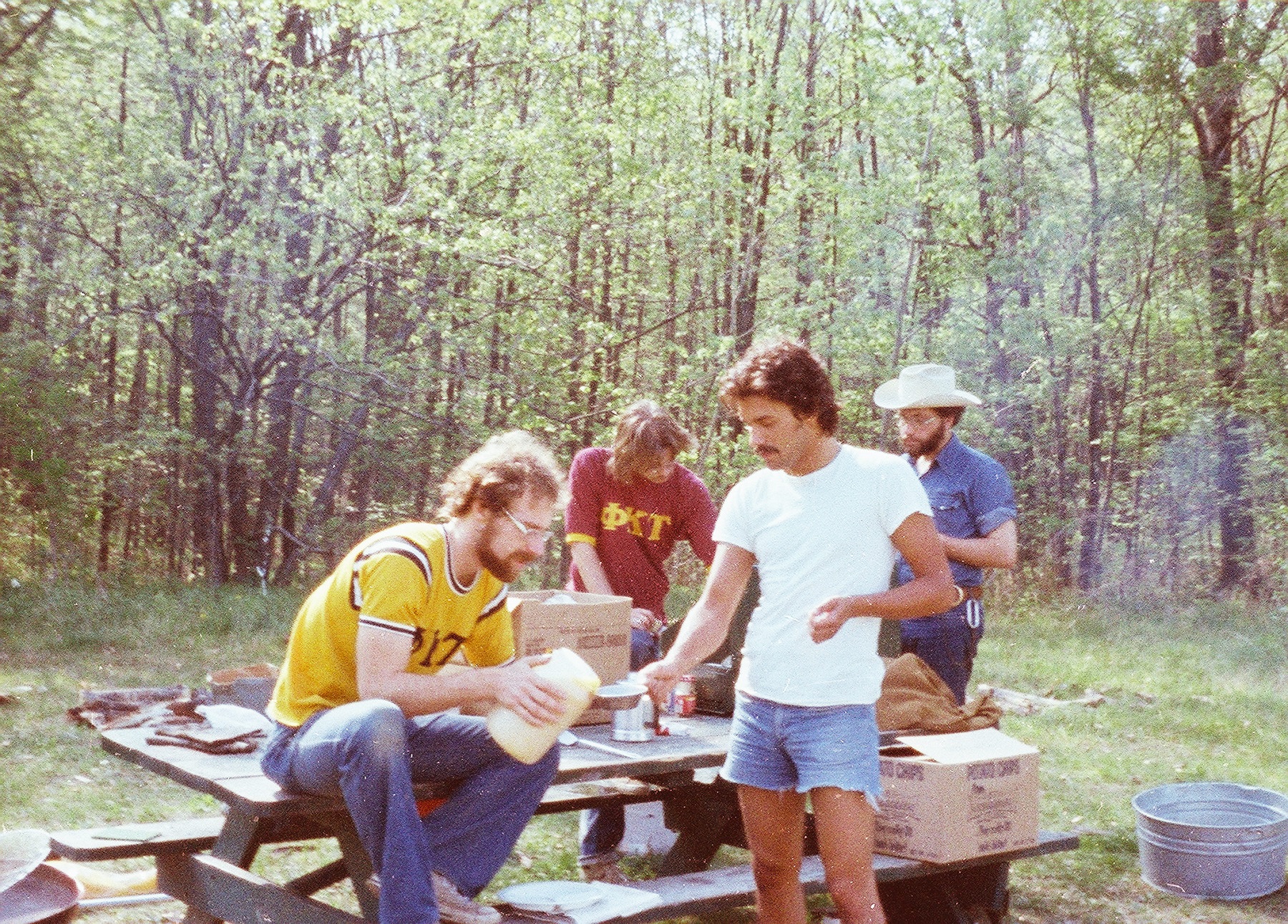 Flashback to 1977: Phi Taus (from left) Joe McLean '78, John Jolly '77, John Kwasny '79, and Dean Kwasny'77 take part in an annual fraternity retreat. (Photo courtesy of Bill Edminster '77)