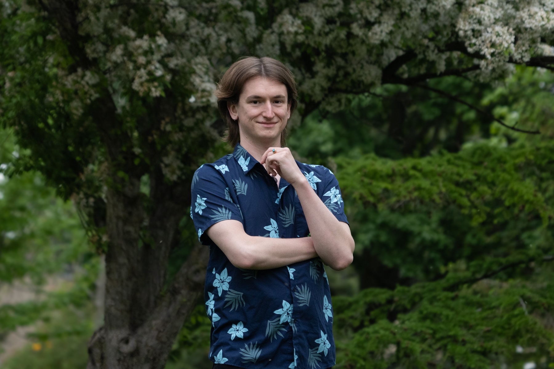 Alex Stanger stands for a portrait outdoors on campus (Photo by Adrian Stancil-Martin '28)