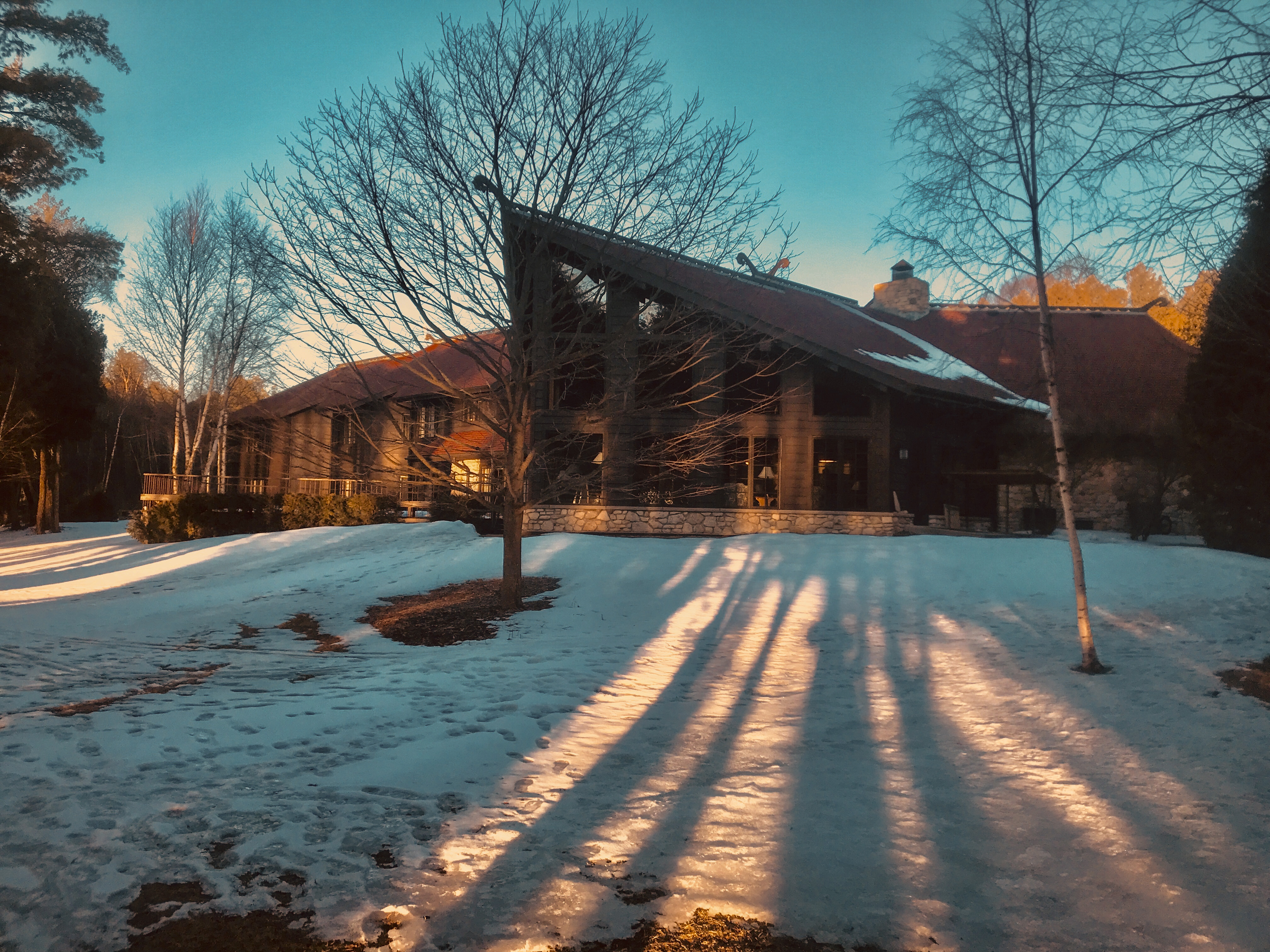 The lodge shines in the depths of winter.