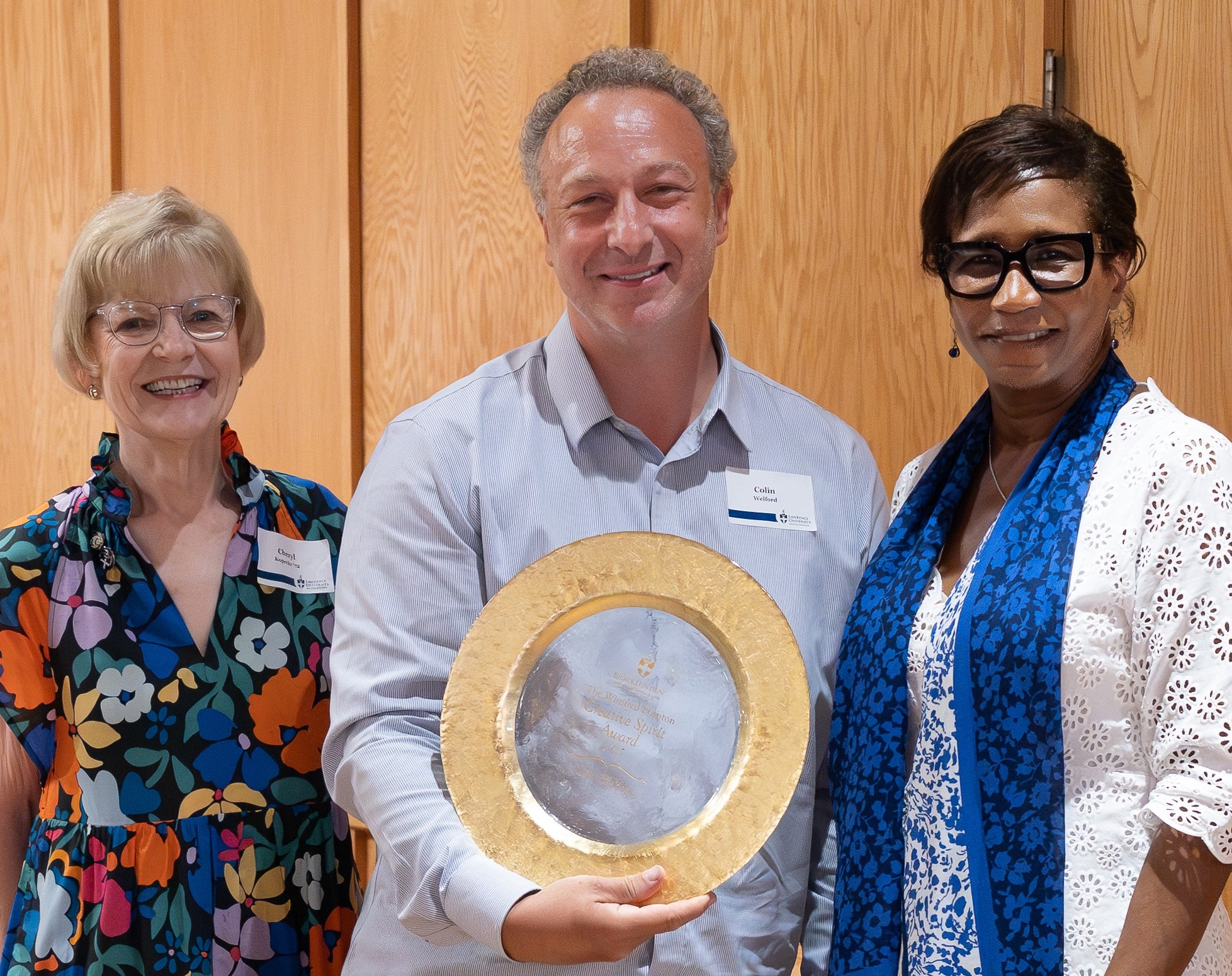 2025 winner of the Winifred Boynton Creative Spirit Award Colin Welford pictured with Cheryl Kopecky '72 and Lawrence University President Laurie Carter