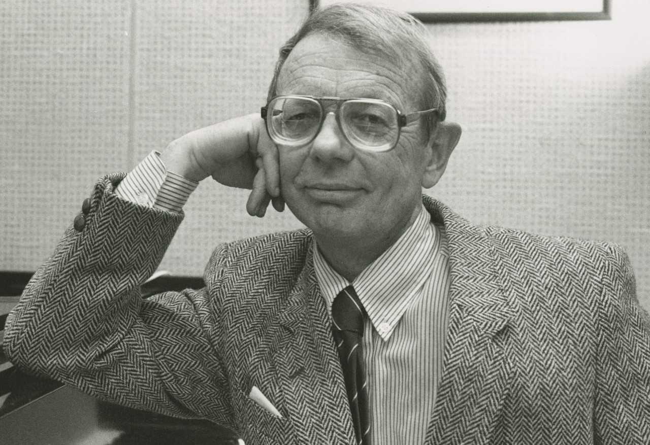 Headshots of a man resting his head on his hand