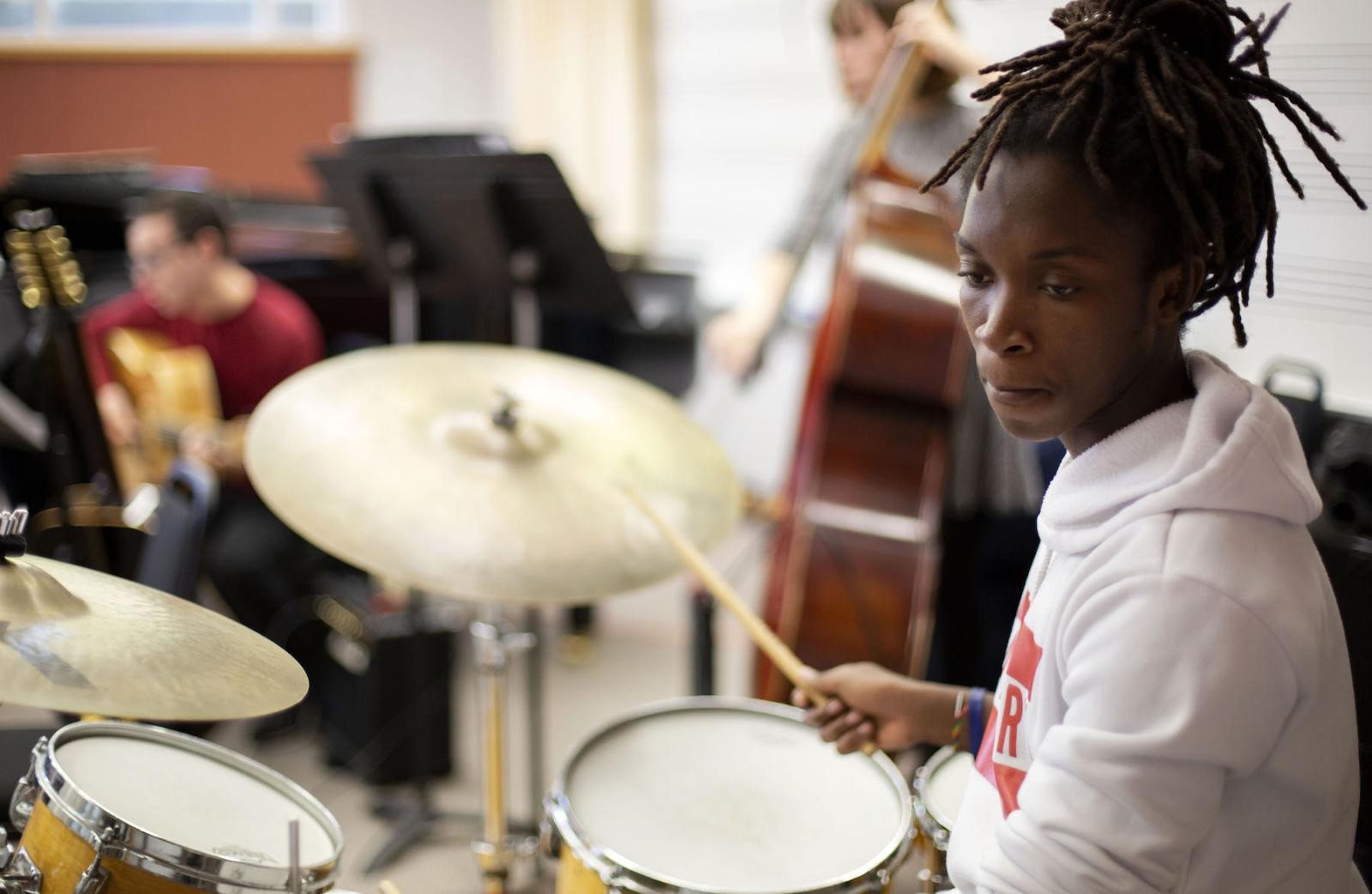 Tarrel Nedderman '22 takes part in a Lawrence University Jazz Ensemble rhythm section rehearsal in advance of Fred Sturm Jazz Celebration Weekend
