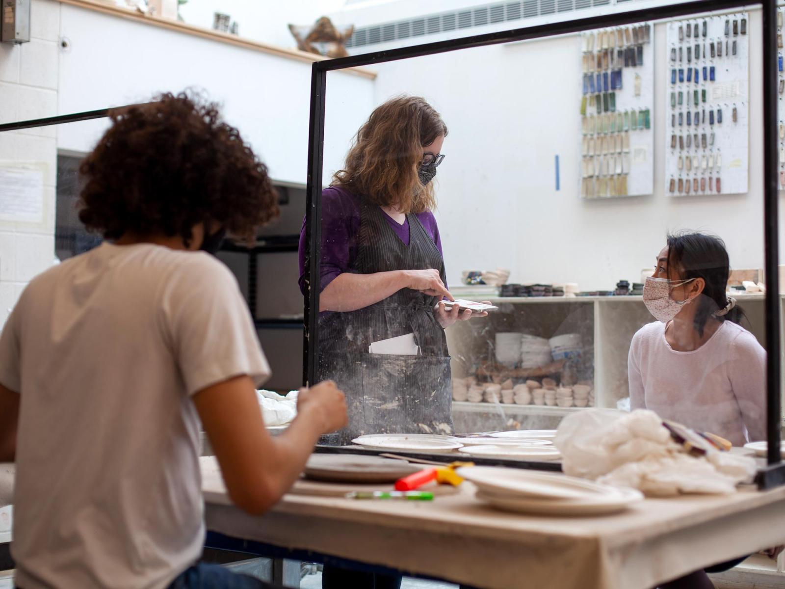 Students working in an art class