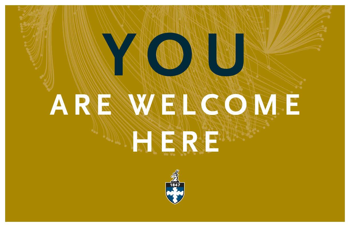 Gold poster with text, "You are welcome here."