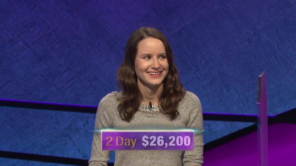 Alex Damisch ’16 smiling while competing in a game of jeopardy