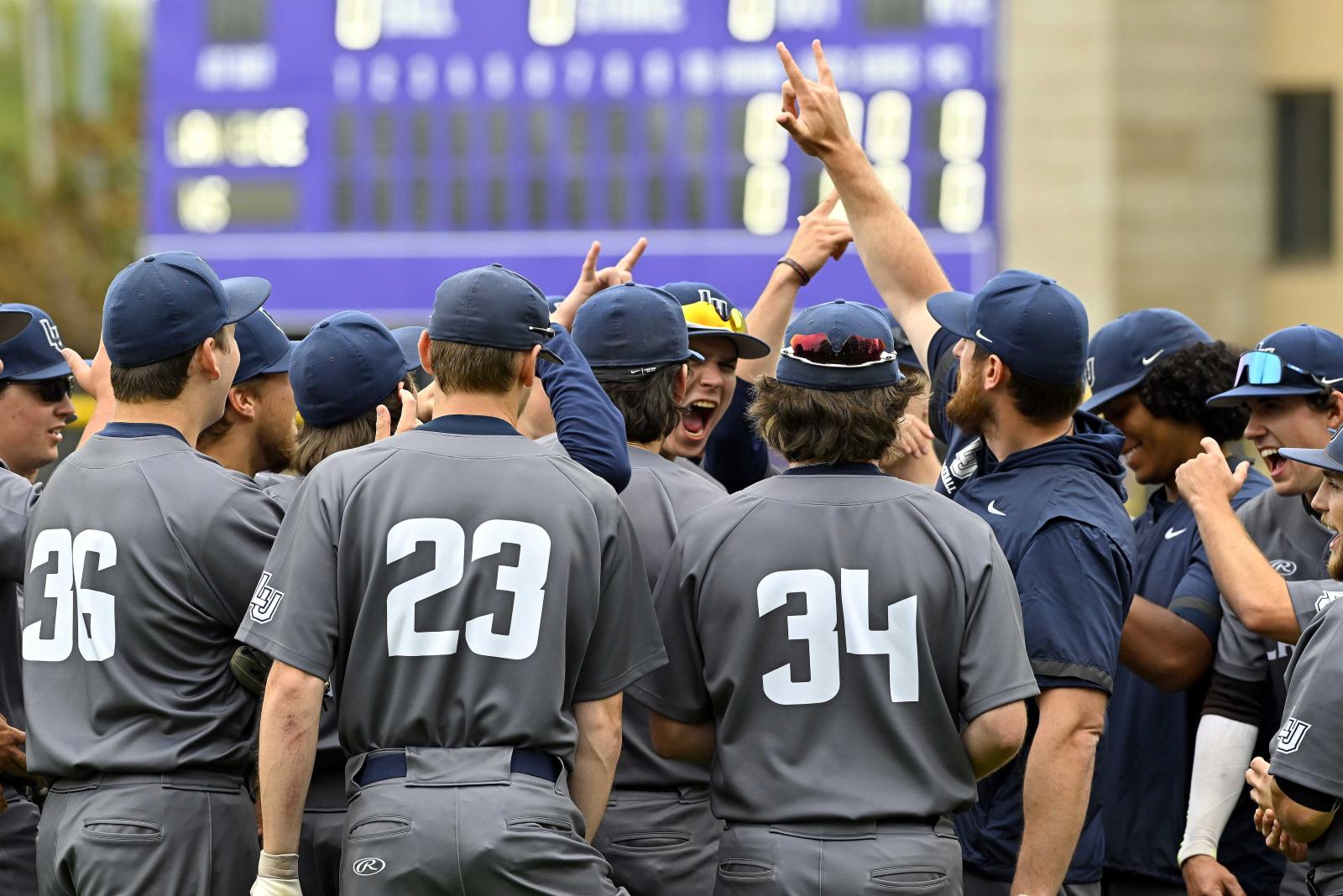 The Vikings baseball team gathers together at the start of the NCAA Division III Tournament regional in Stevens Point. (Photo by Paul Wilke)