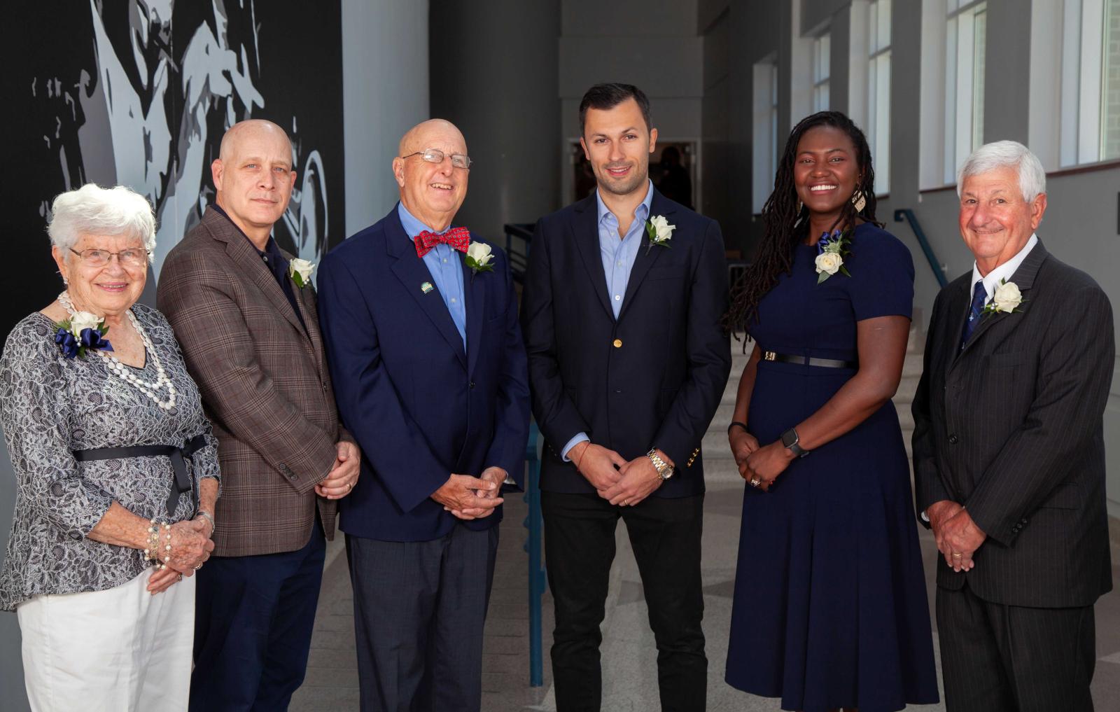 Alumni Award winners pose for a photo.