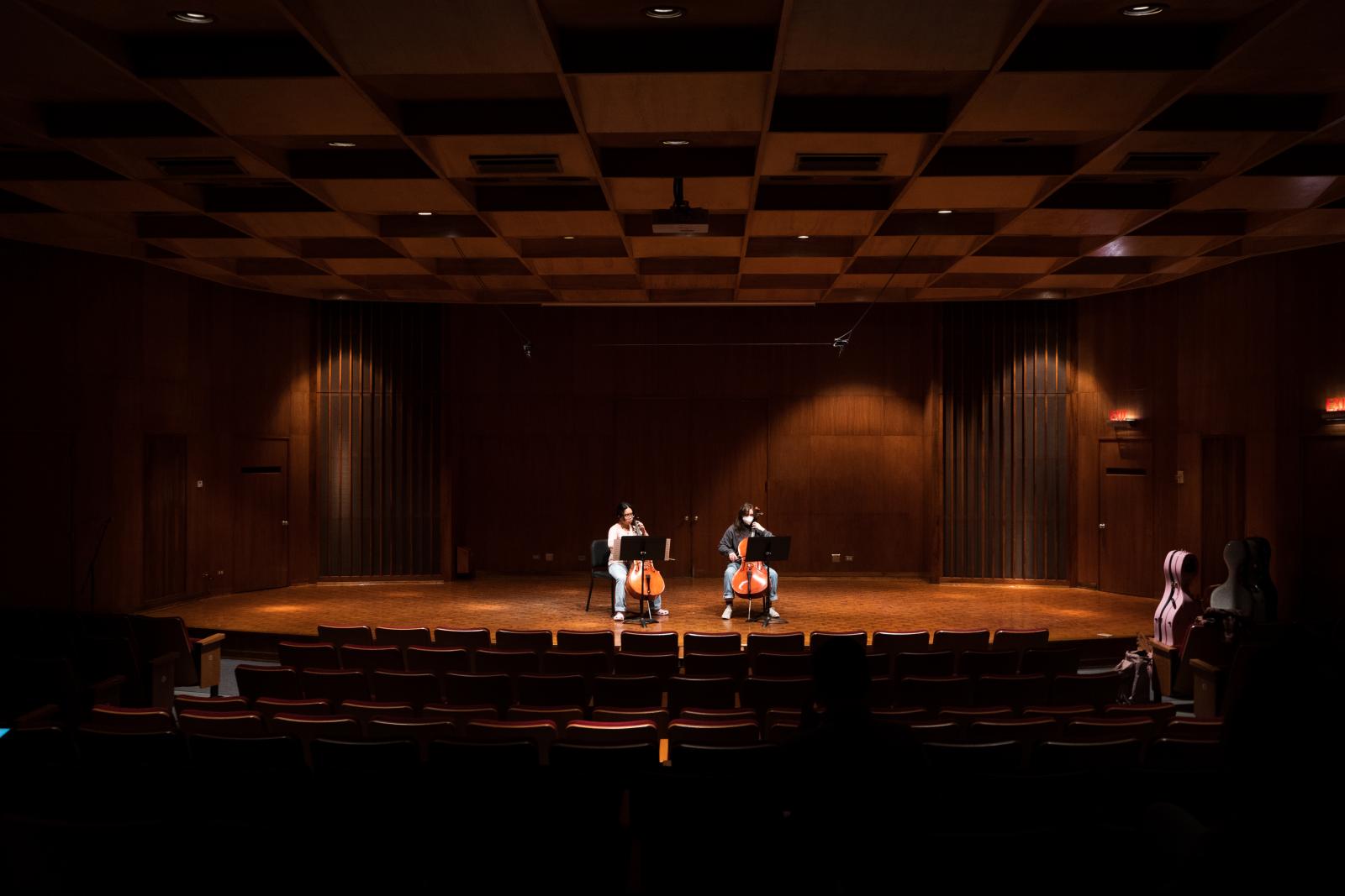 Smaller concert hall with 2 cellists on stage
