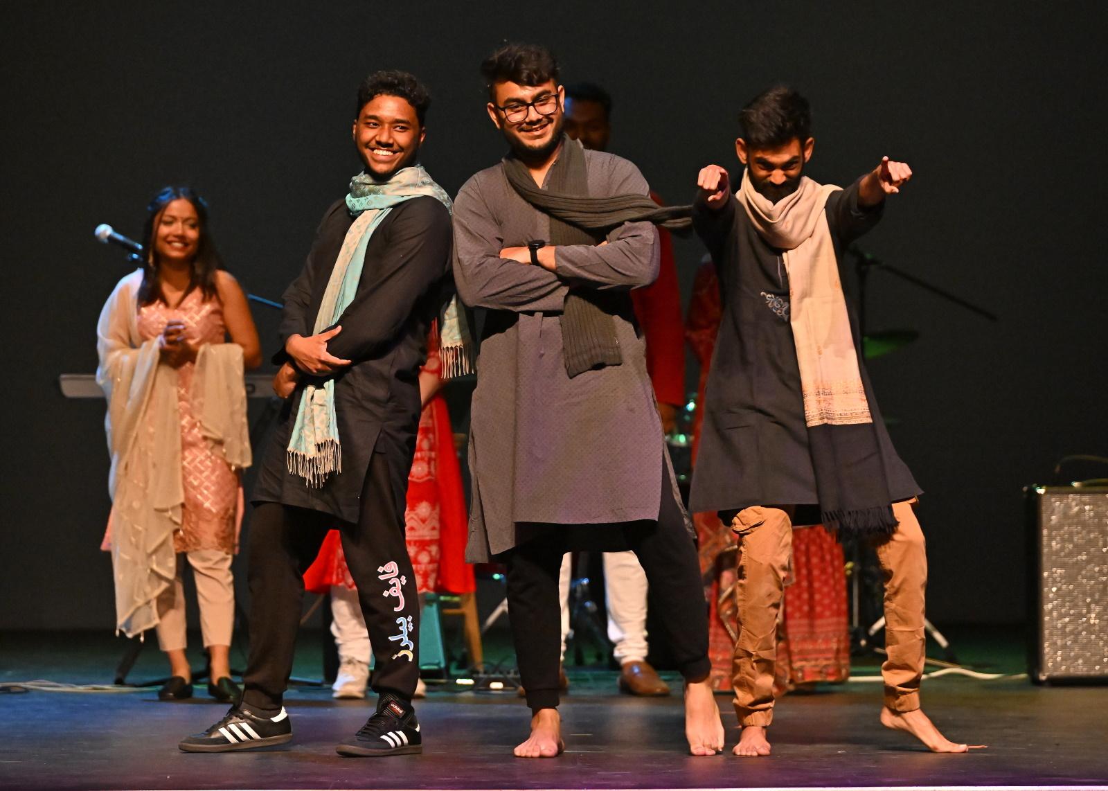 Students pose on stage during Cabaret.