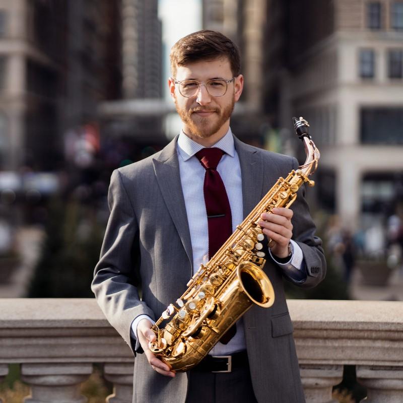 Joe Connor '16 holds his saxophone.