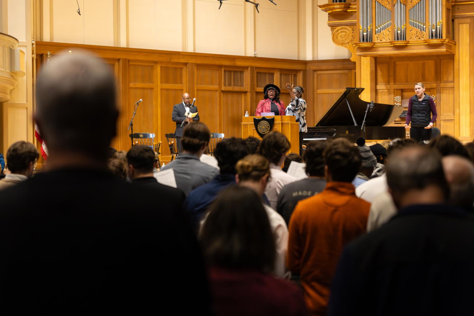 Attendees sing Lift Every Voice and Sing during the Jan. 15 MLK Celebration in Memorial Chapel.