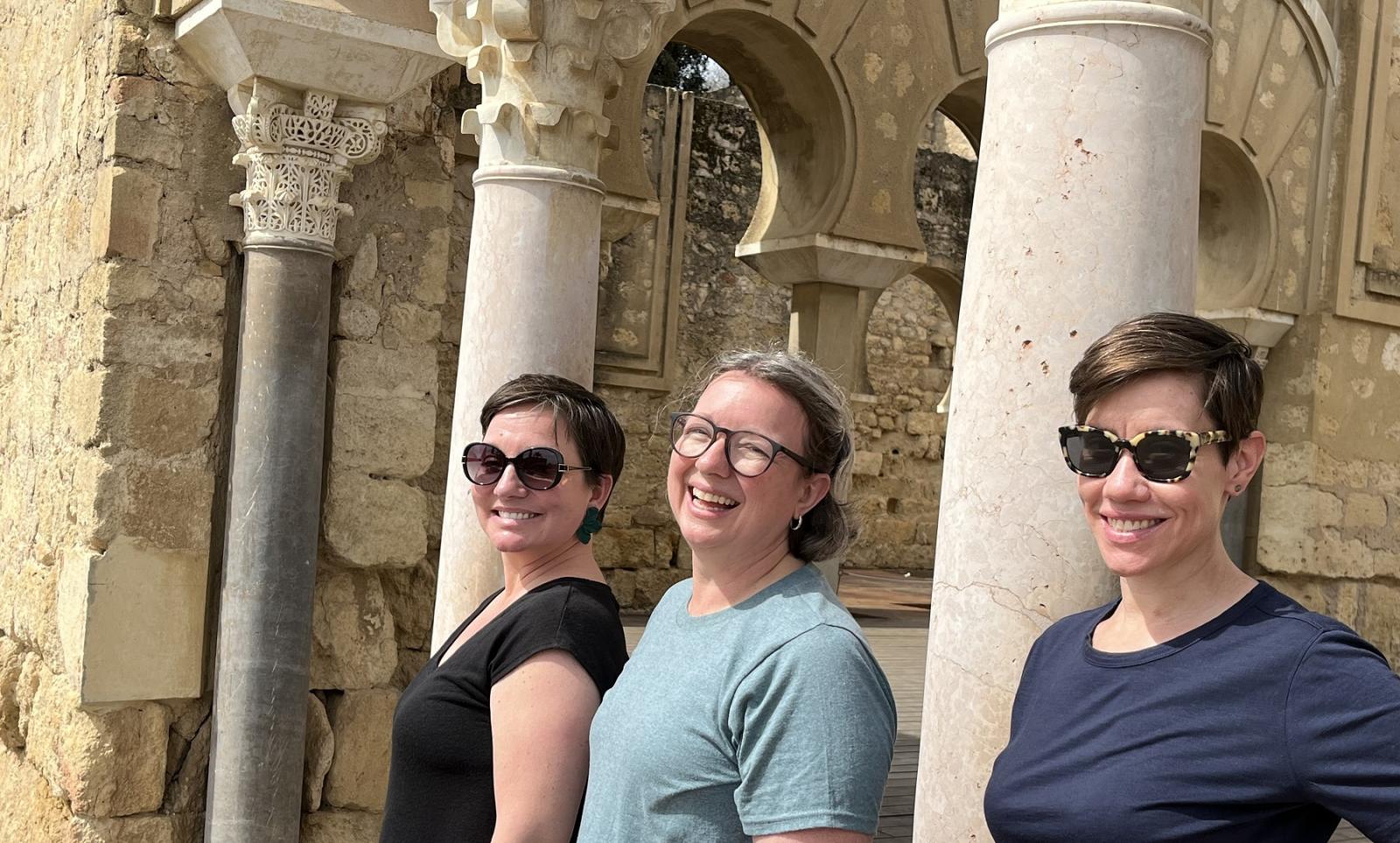 Madera Allan, Danielle Joyner, and Sara Gross Ceballos pose for a photo in the 10th-century ruins of Madinat al-Zahra, the palace complex built outside of Córdoba.  