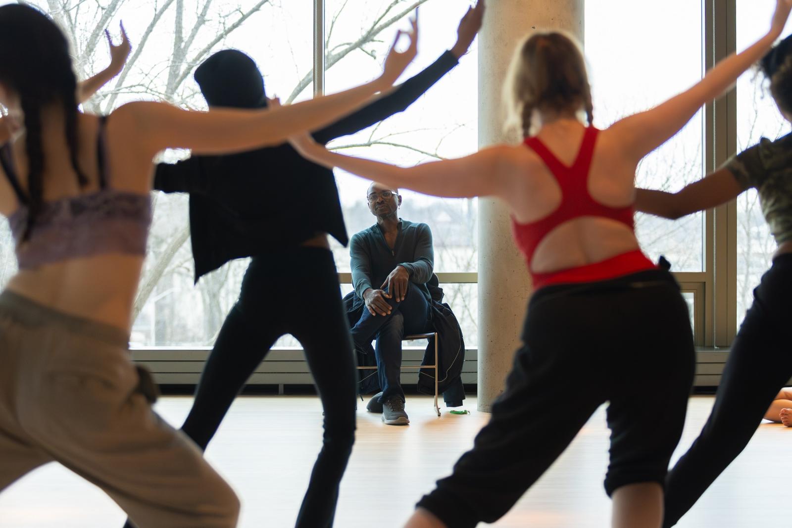 Robert Battle leads students in dance instruction in Warch Campus Center.