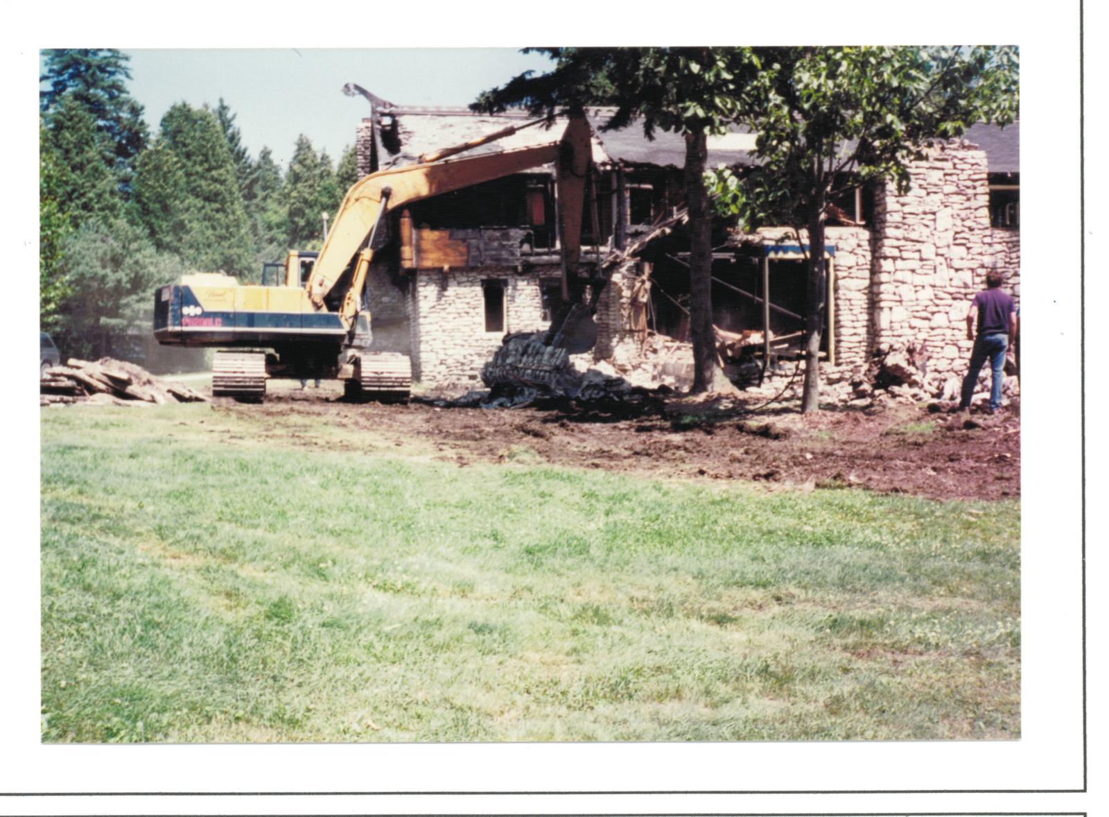 The badly burnt lodge gets demolished