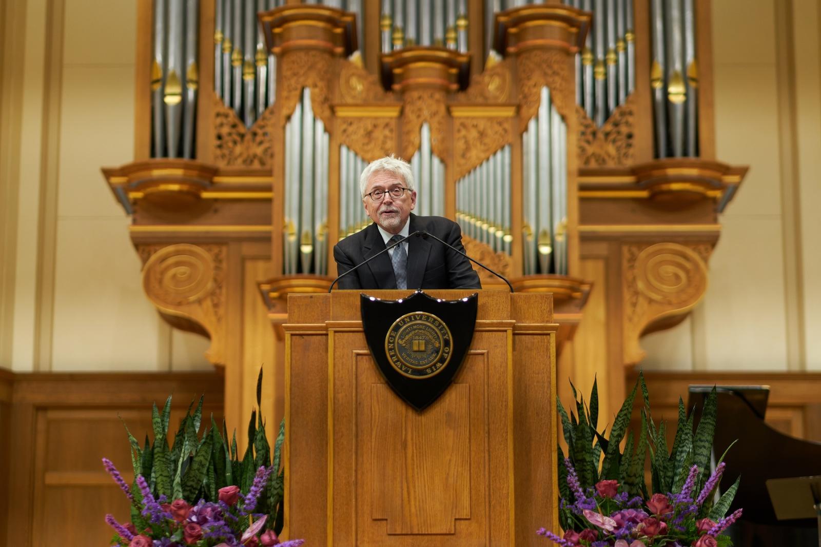 Robert McDonald speaks from the stage of Memorial Chapel during Saturday's Baccalaureate service.